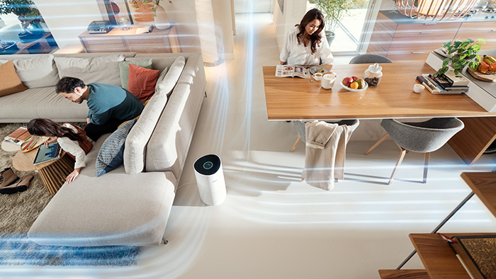 Rendimiento &oacute;ptimo, familia sentada en el sal&oacute;n